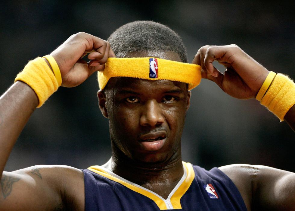 Jermaine O'Neal #7 of the Indiana Pacers adjusts his headband.