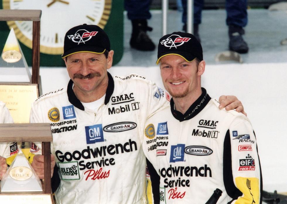 Dale Earnhardt Sr. and his son, Dale Earnhard Jr., pose together at the raceway in Daytona Beach, Florida.