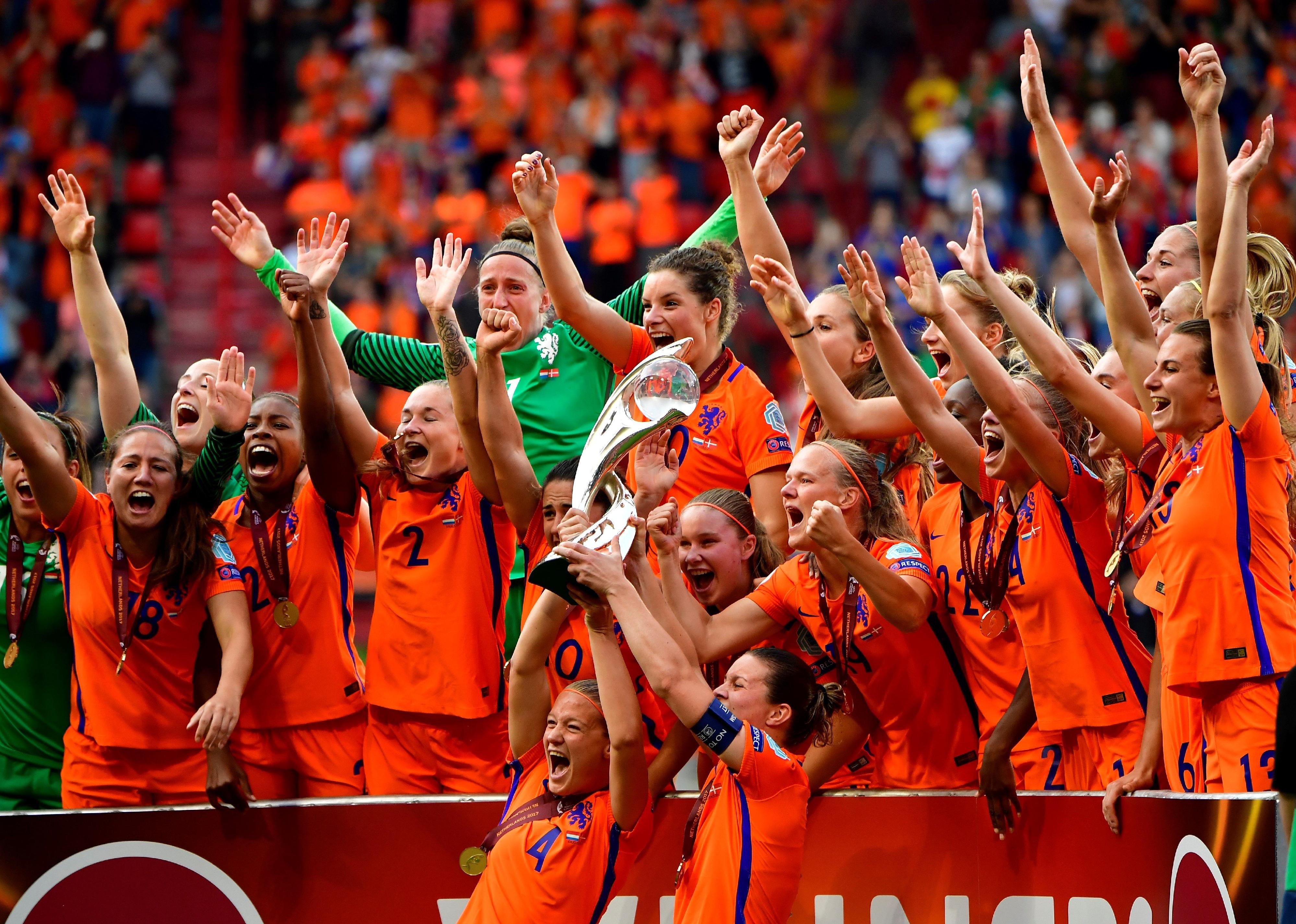 Netherlands' team players celebrate with the trophy after winning the UEFA Womens Euro 2017 football tournament final match.