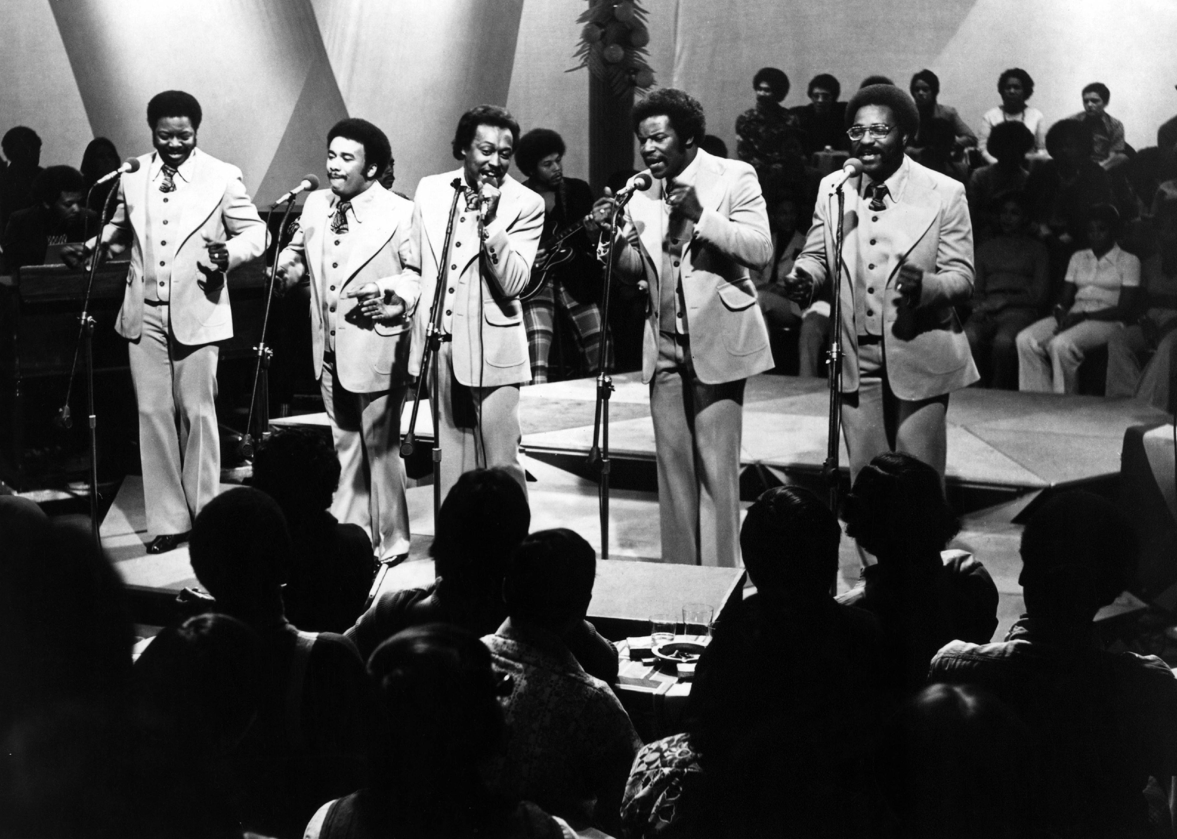 The Spinners performing for a studio audience.