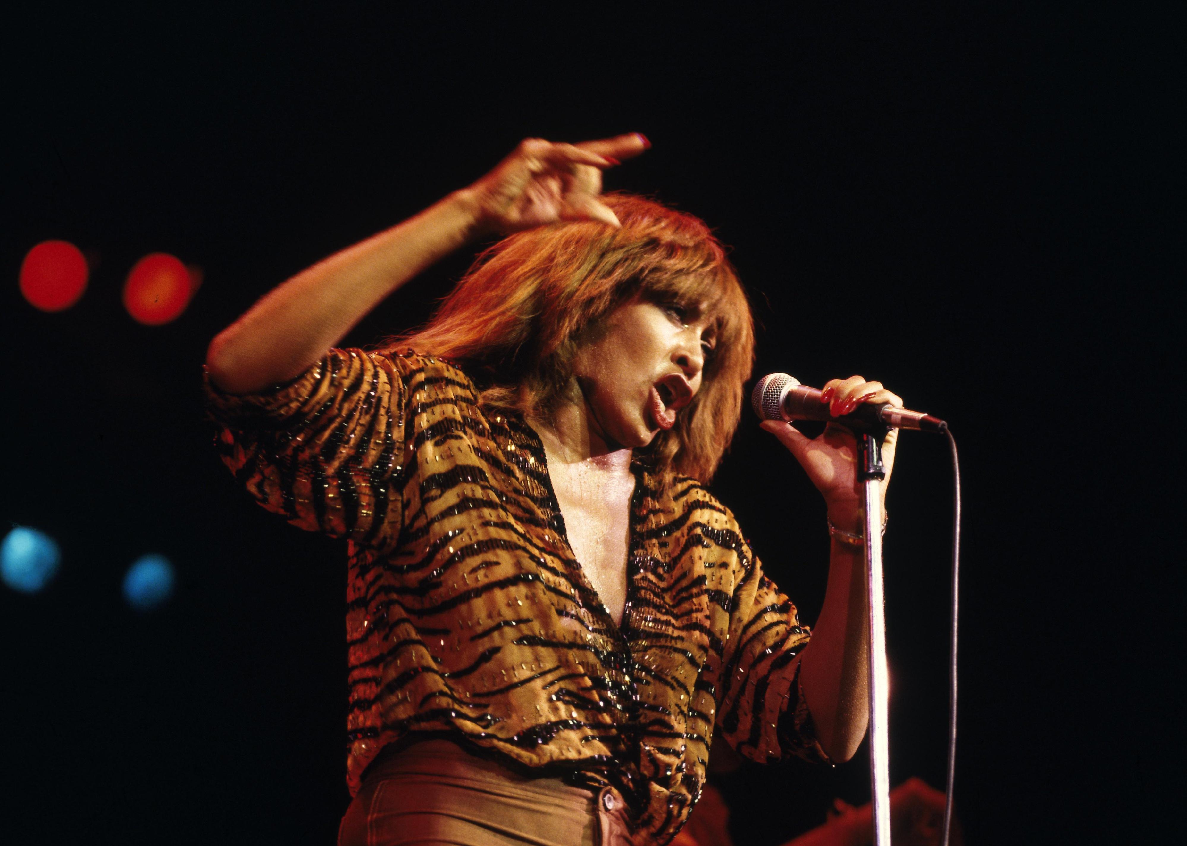 Tina Turner performs live on stage at Hammersmith Odeon in London.