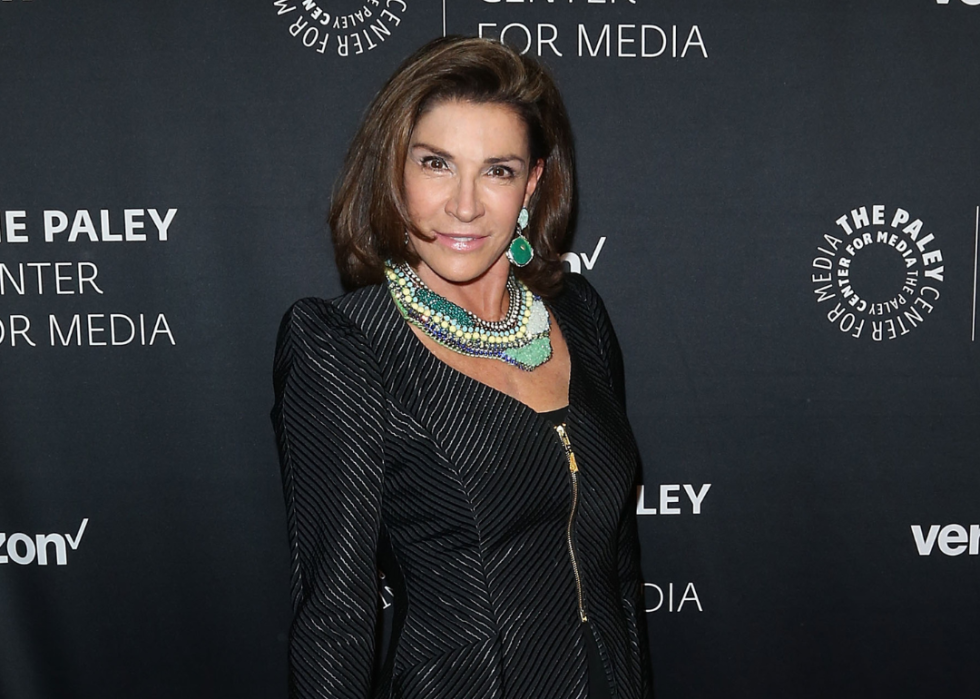 Hilary Farr poses in all black at an event.