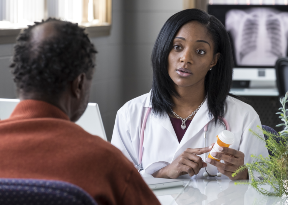 A doctor talks with a patient about a prescription.