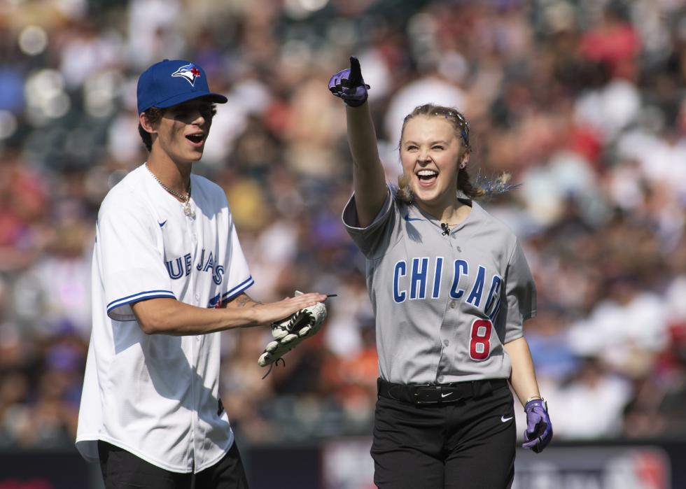  Social media influencer Josh Richards and Media Personality JoJo Siwa dressed in baseball uniforms on the field during the MLB All-Star Celebrity Softball Game at Coors Field on July 11, 2021 in Denver, Colorado. 