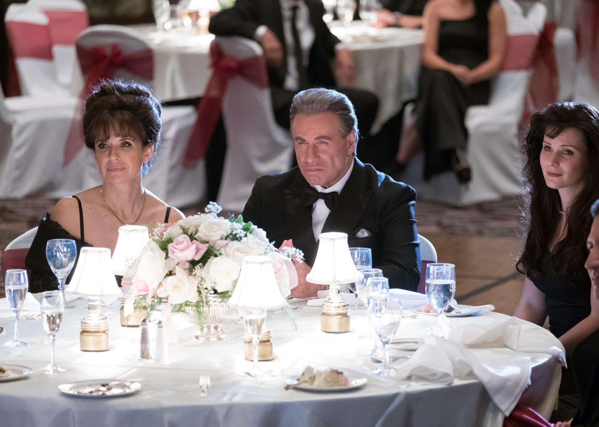 John Travolta and Kelly Preston dressed up at a dinner event.