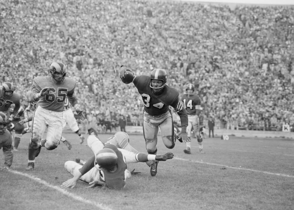 Bob Boyd trips Joe Perry during a Rams vs. 49ers game in 1955.
