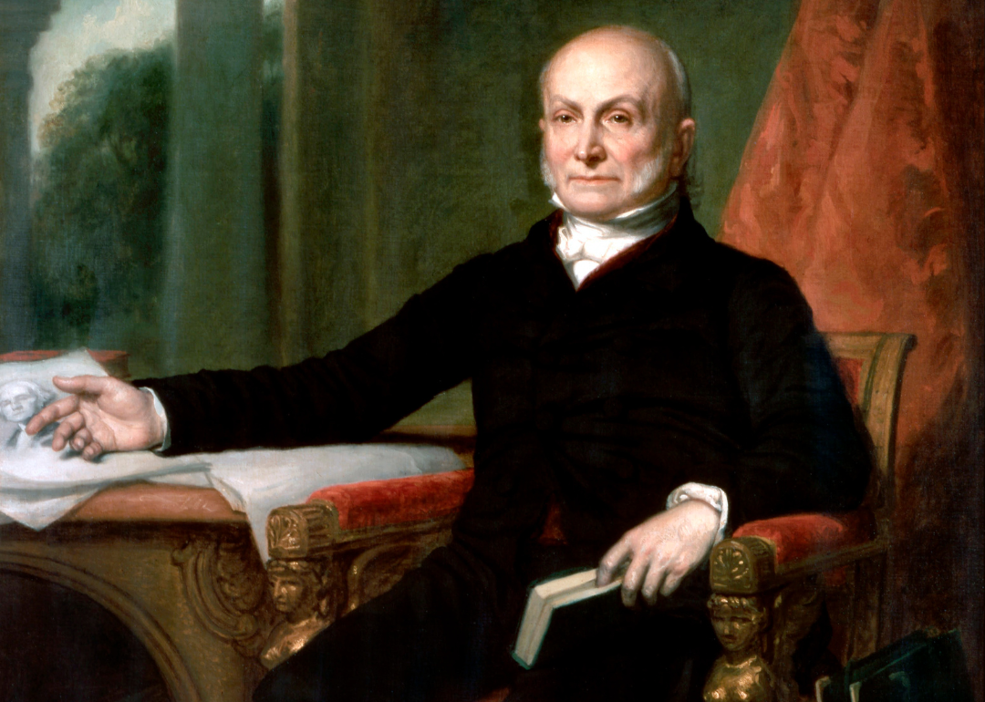 A painting of John Quincy Adams sitting in a chair.
