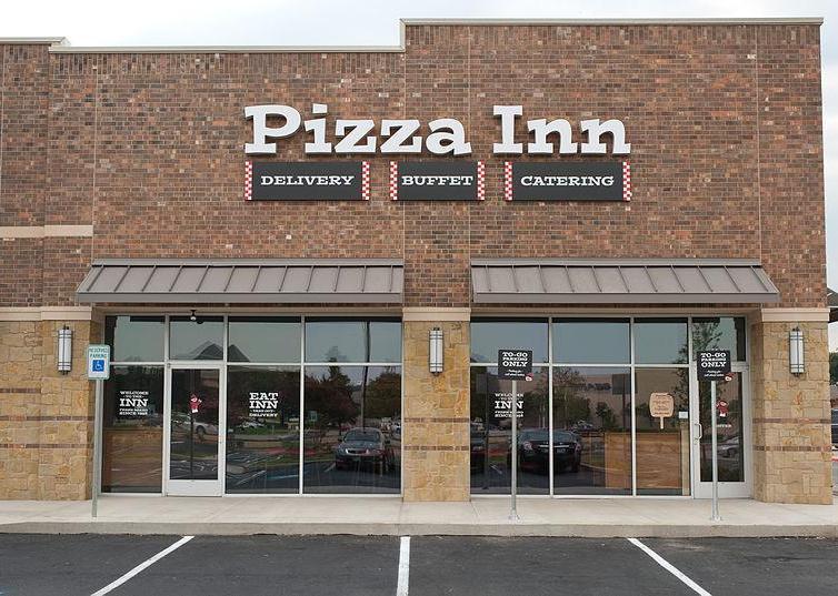 A brick Pizza Inn restaurant.