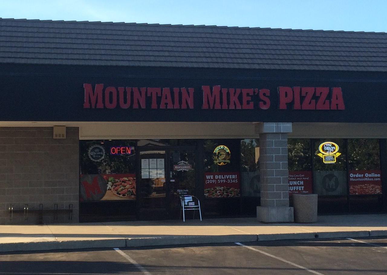 The exterior of a Mountain Mike's Pizza.