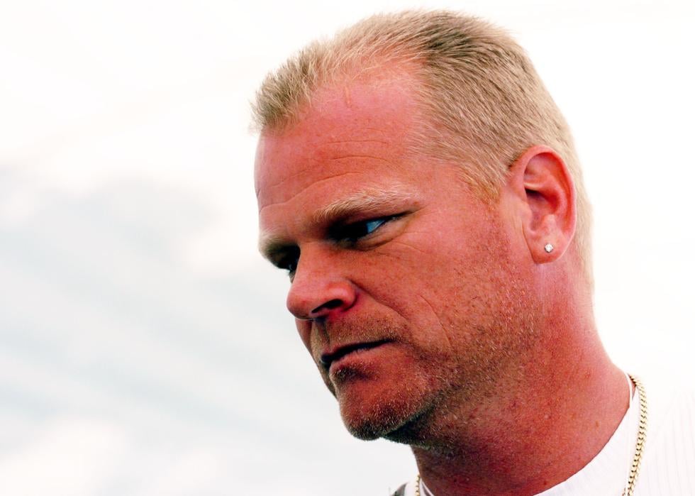 Mike Holmes looks over at someone.