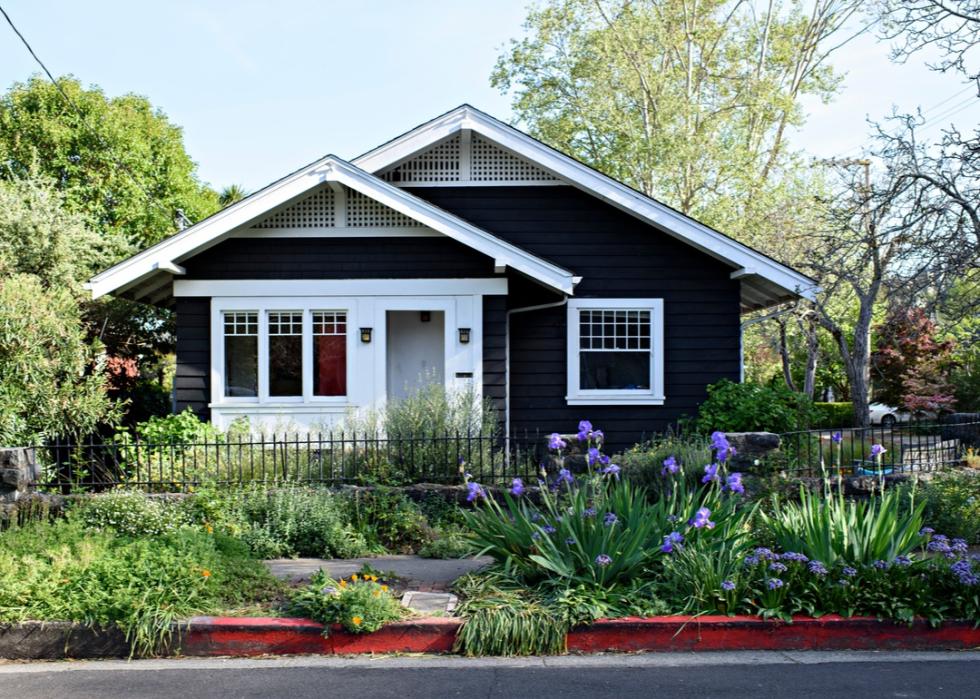 Navy blue craftsman home.