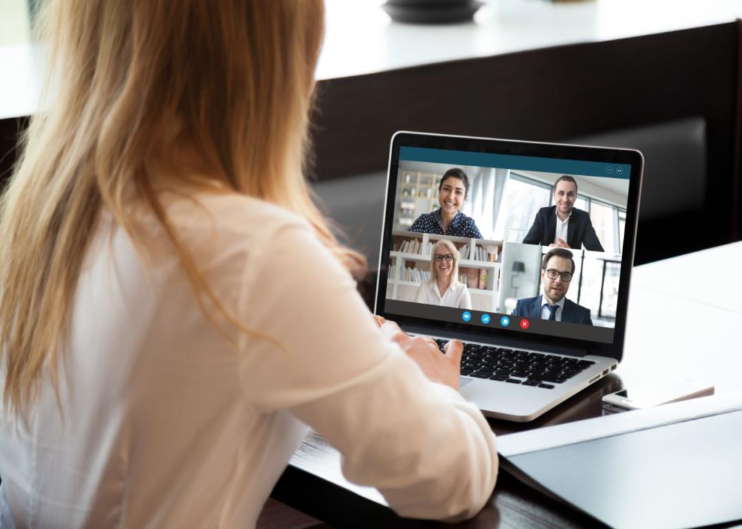 A person on a Zoom call with a team.
