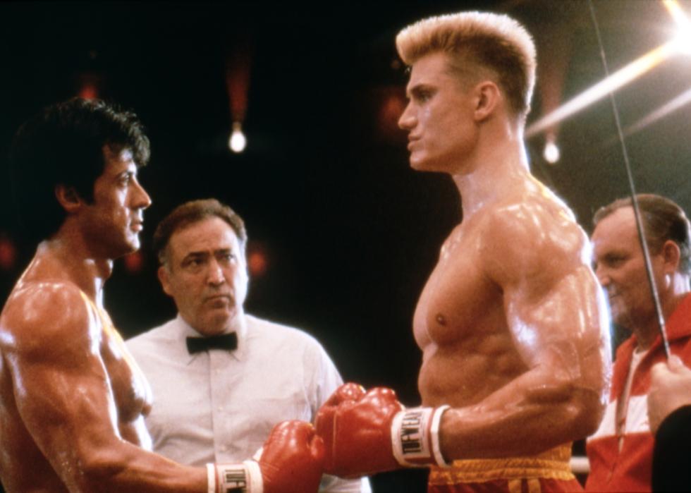 Sylvester Stallone faces off with Dolph Lundgren in the boxing ring.