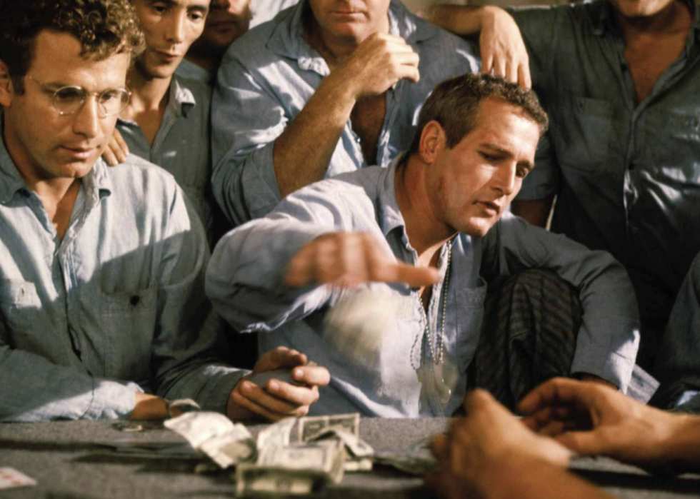 Paul Newman at the table in a scene from "Cool Hand Luke"