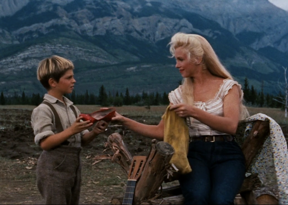 Marilyn Monroe and Tommy Rettig in "River of No Return"