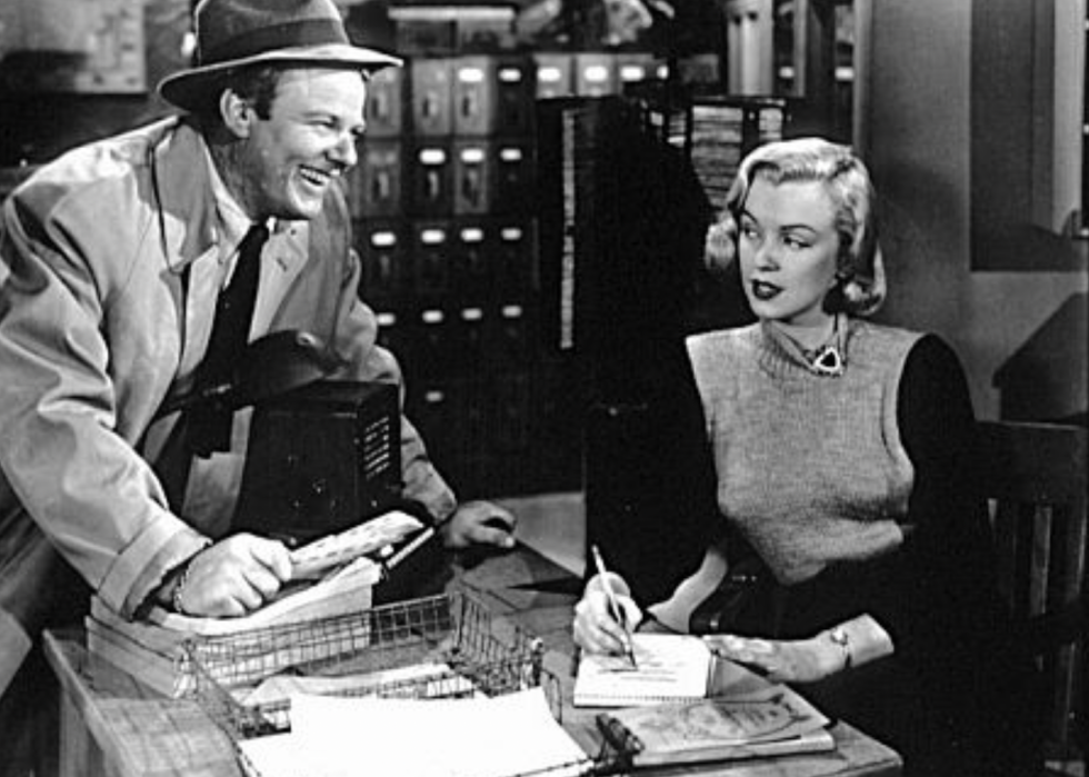 Marilyn Monroe and Alan Hale Jr. in a scene from "Home Town Story"