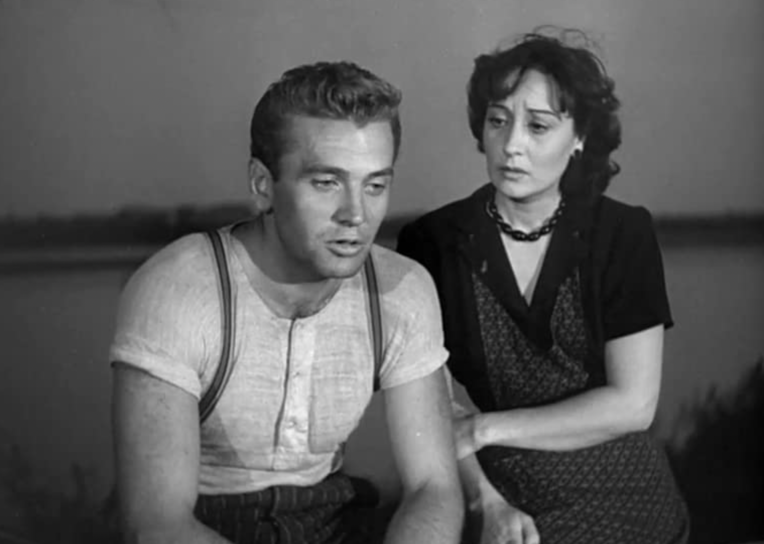 Clara Calamai and Massimo Girotti in "Obsession"