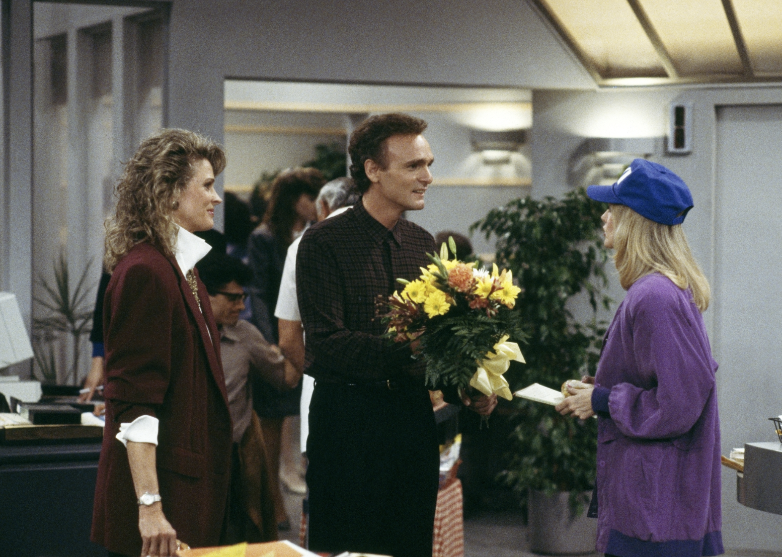 Candice Bergen, Morgan Fairchild, and Joe Regalbuto in "Murphy Brown"
