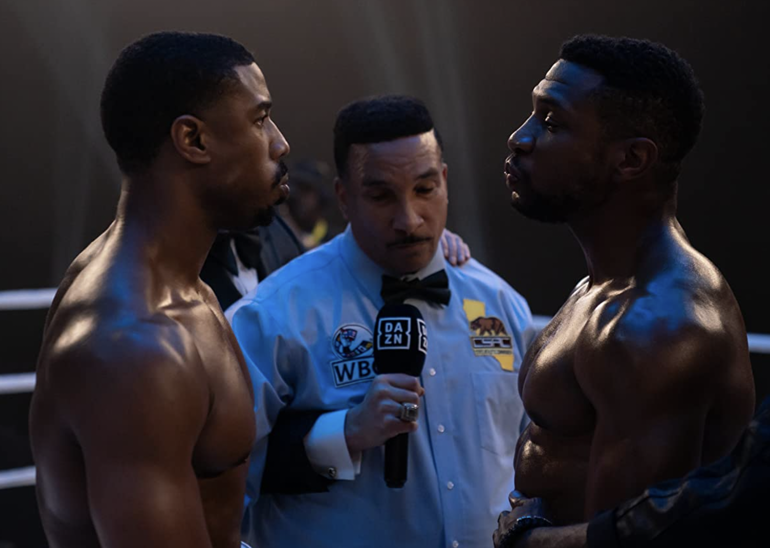 Michael B. Jordan, Jonathan Majors, and Tony Weeks in "Creed III".