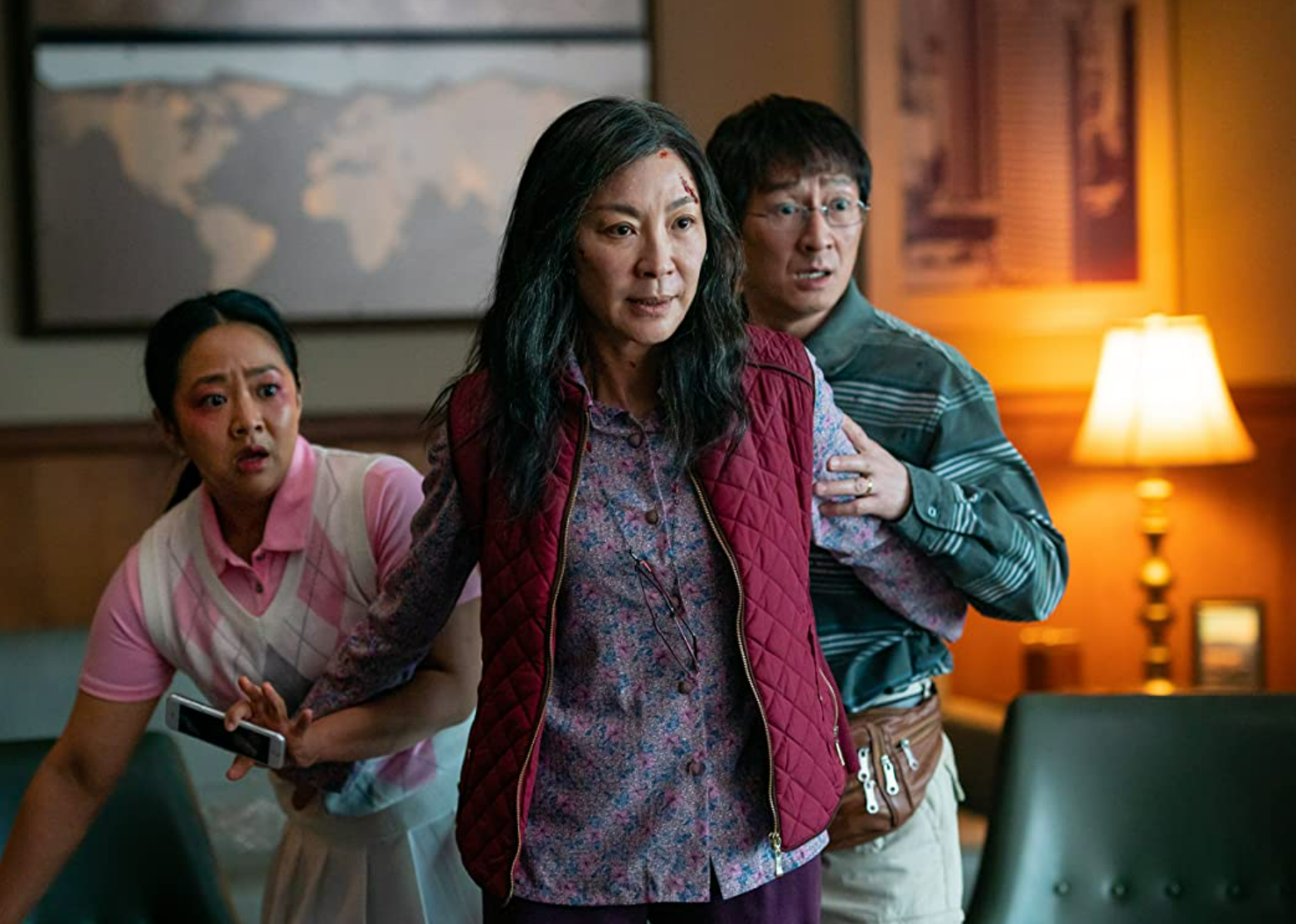Michelle Yeoh, Ke Huy Quan, and Stephanie Hsu in a scene from "Everything Everywhere All at Once".