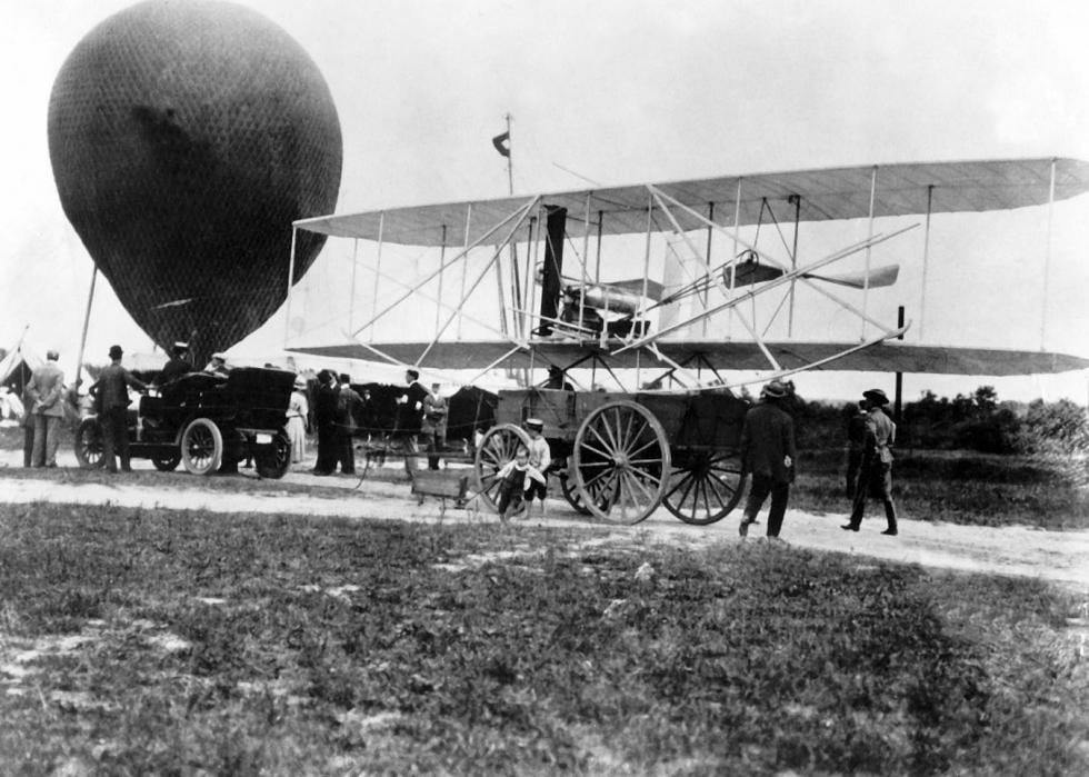 Pictured: The Wright Military Flyer arrives at Fort Myer, Virginia, aboard a wagon, 1908
