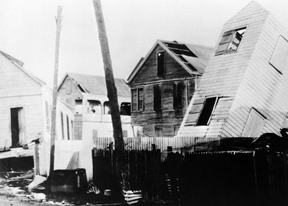 Destroyed homes on a residential street.