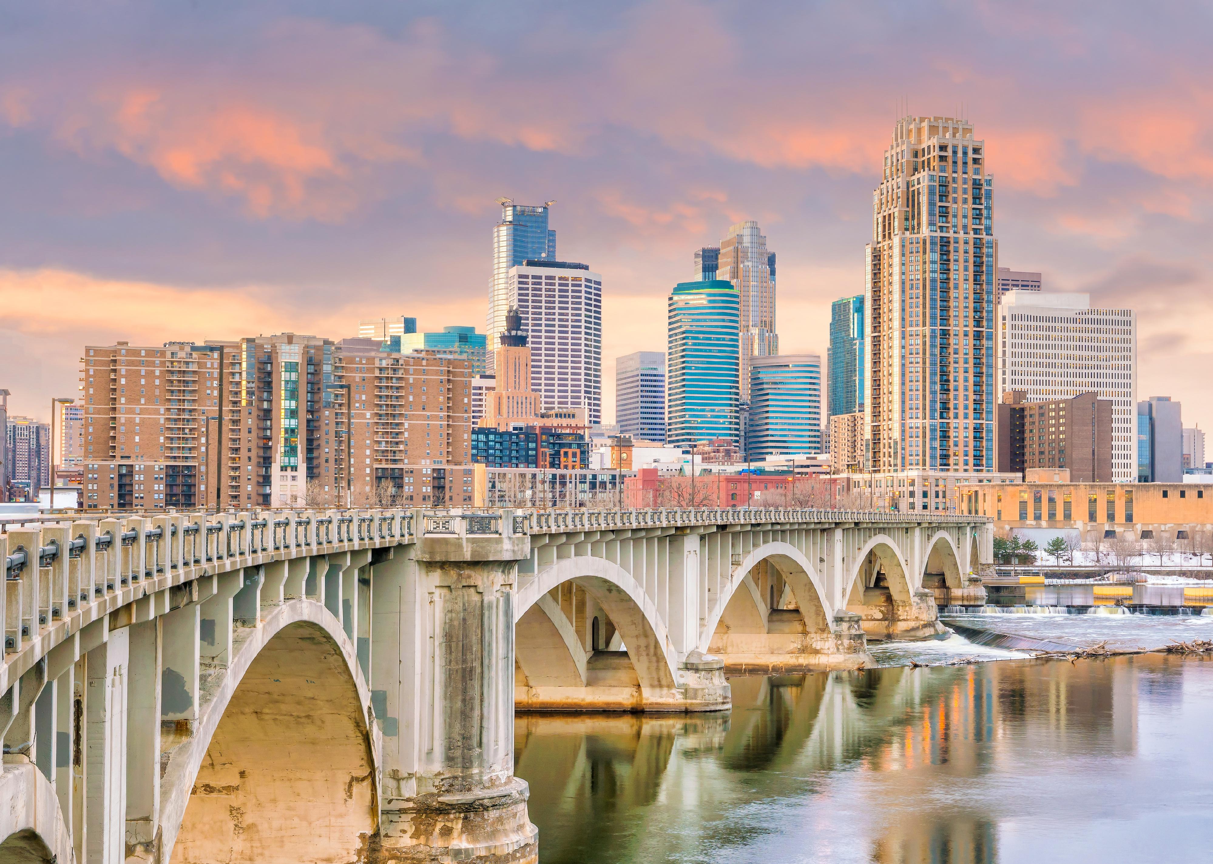 Minneapolis downtown skyline in Minnesota at sunset.