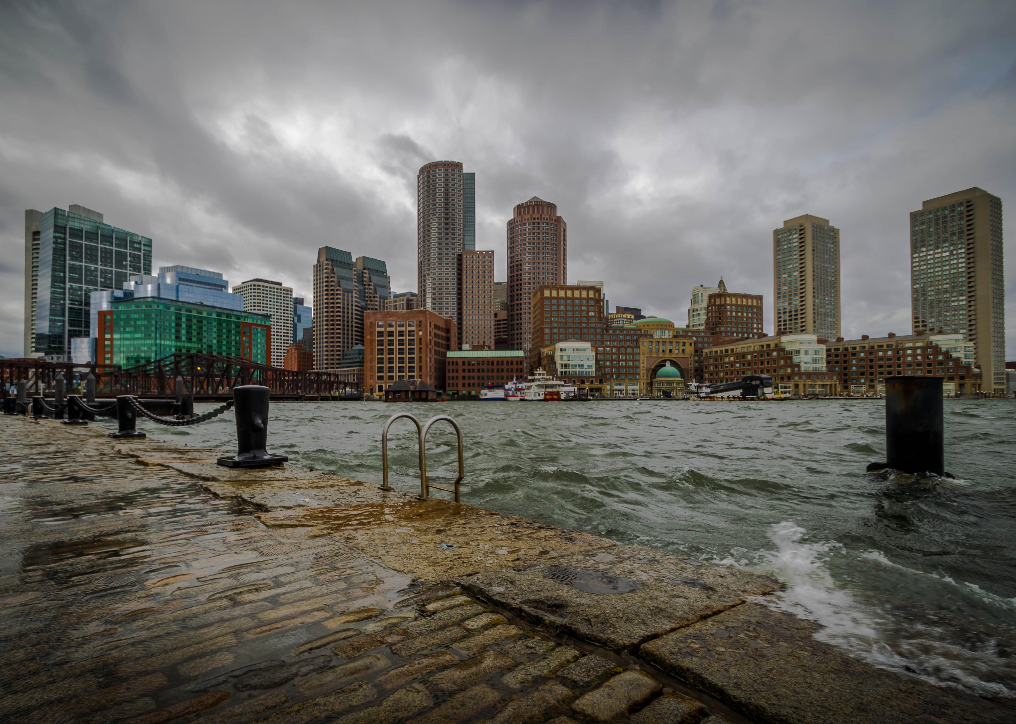 A winter Nor'easter storm surge floods Boston Harbor.