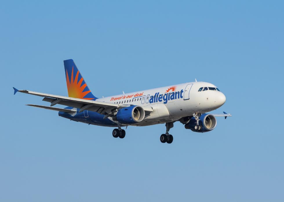 Allegiant airplane approaching airport for landing