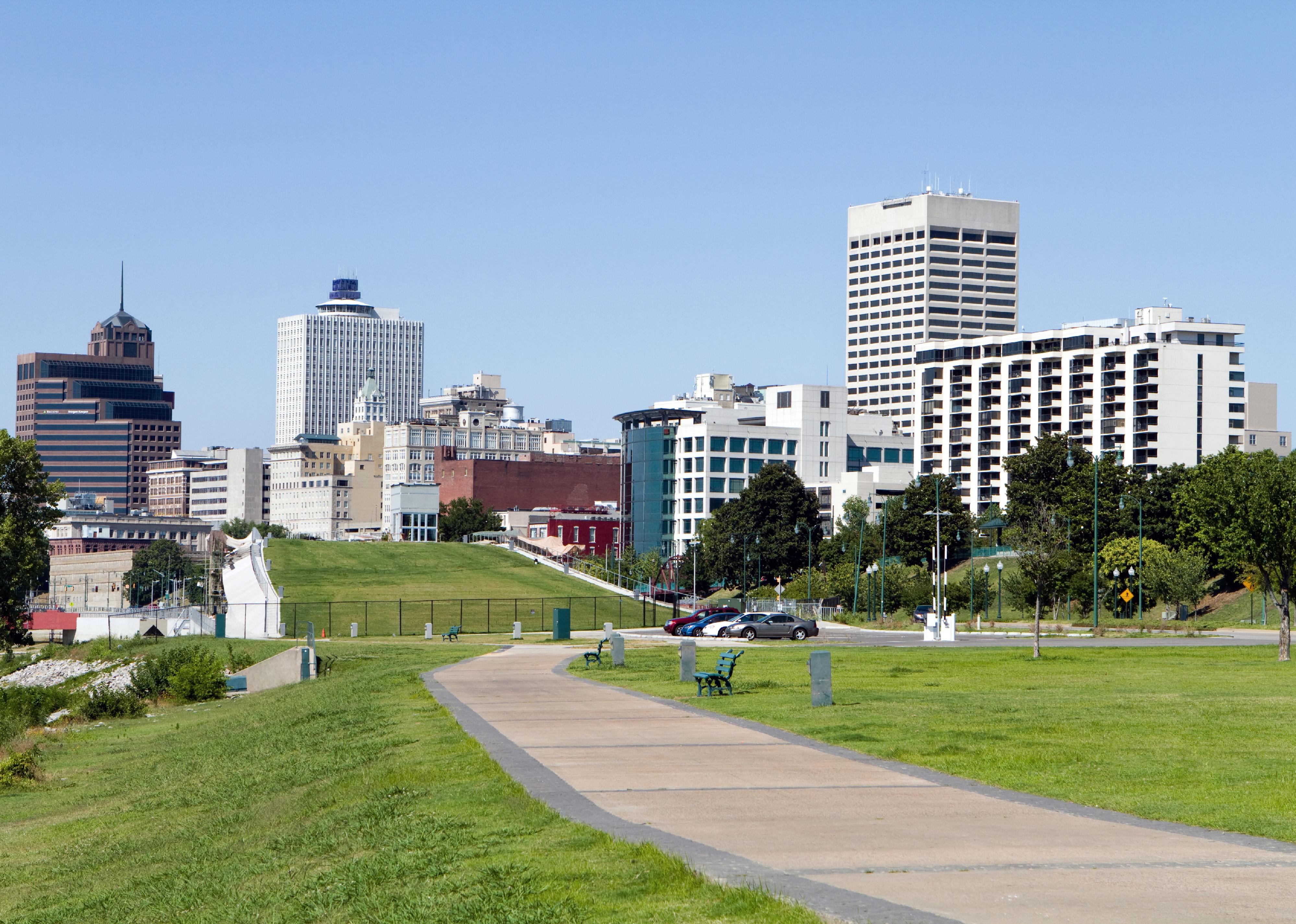 View of the Memphis, Tennessee city skyline from a park in the downtown area.