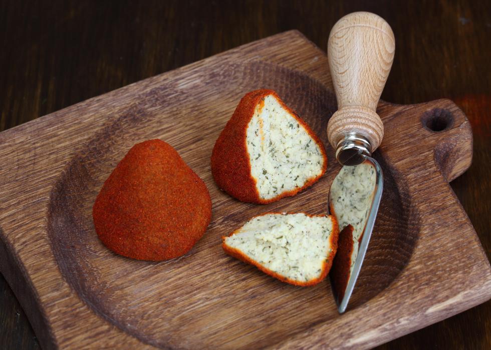 10 of the Smelliest Cheeses in the World (and Why They Stink) Stacker