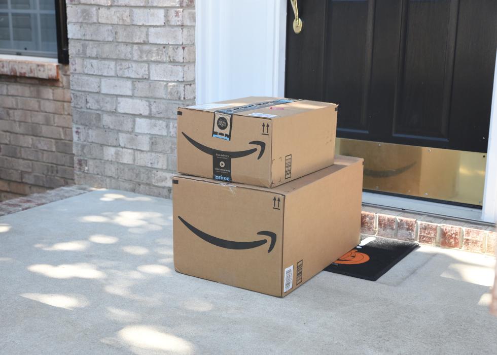 Amazon packages at the front door of a residence
