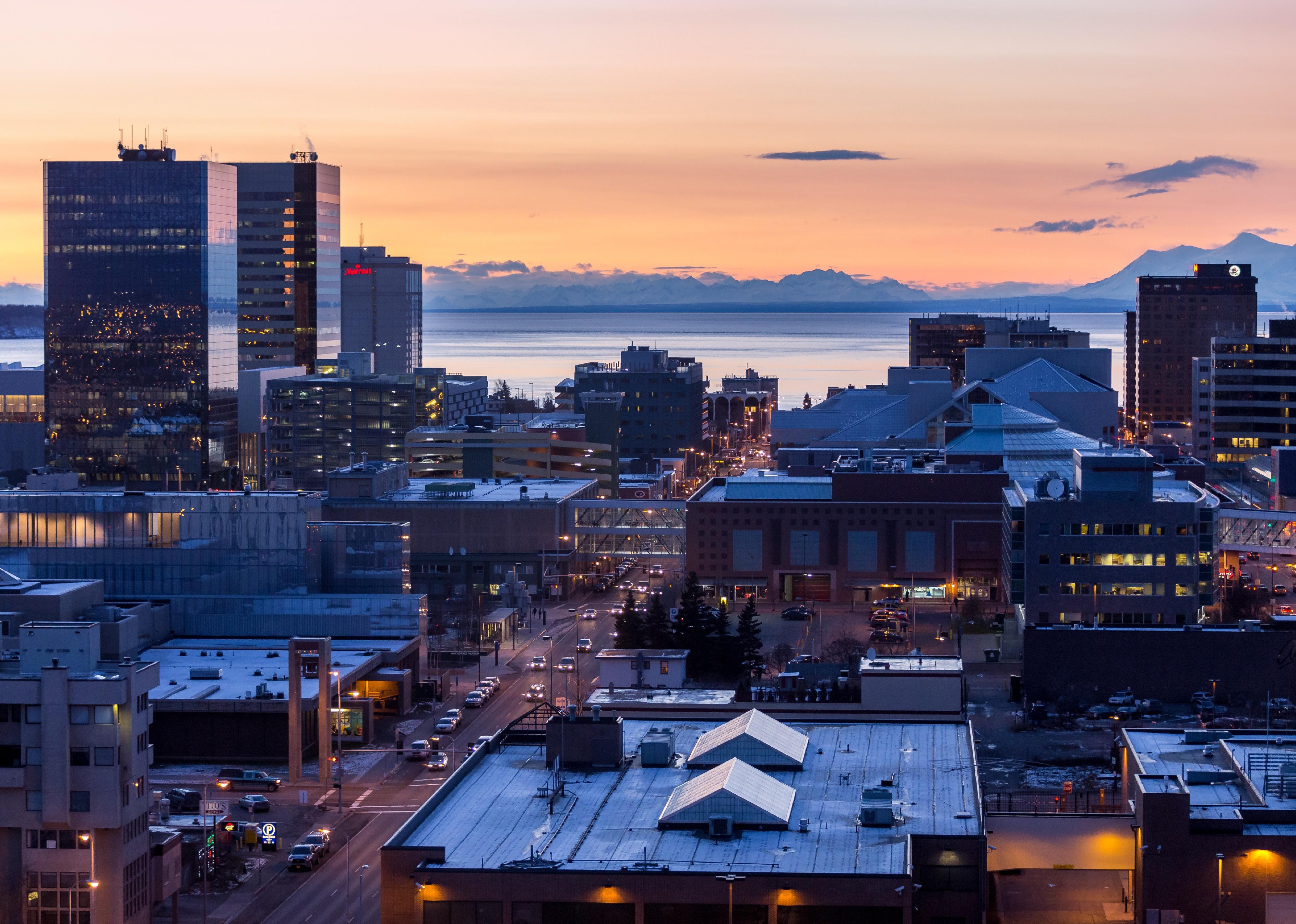Downtown Anchorage, Alaska city skyline at twilight time during winter.