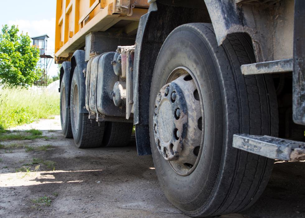 Close up of the wheels of a dump truck