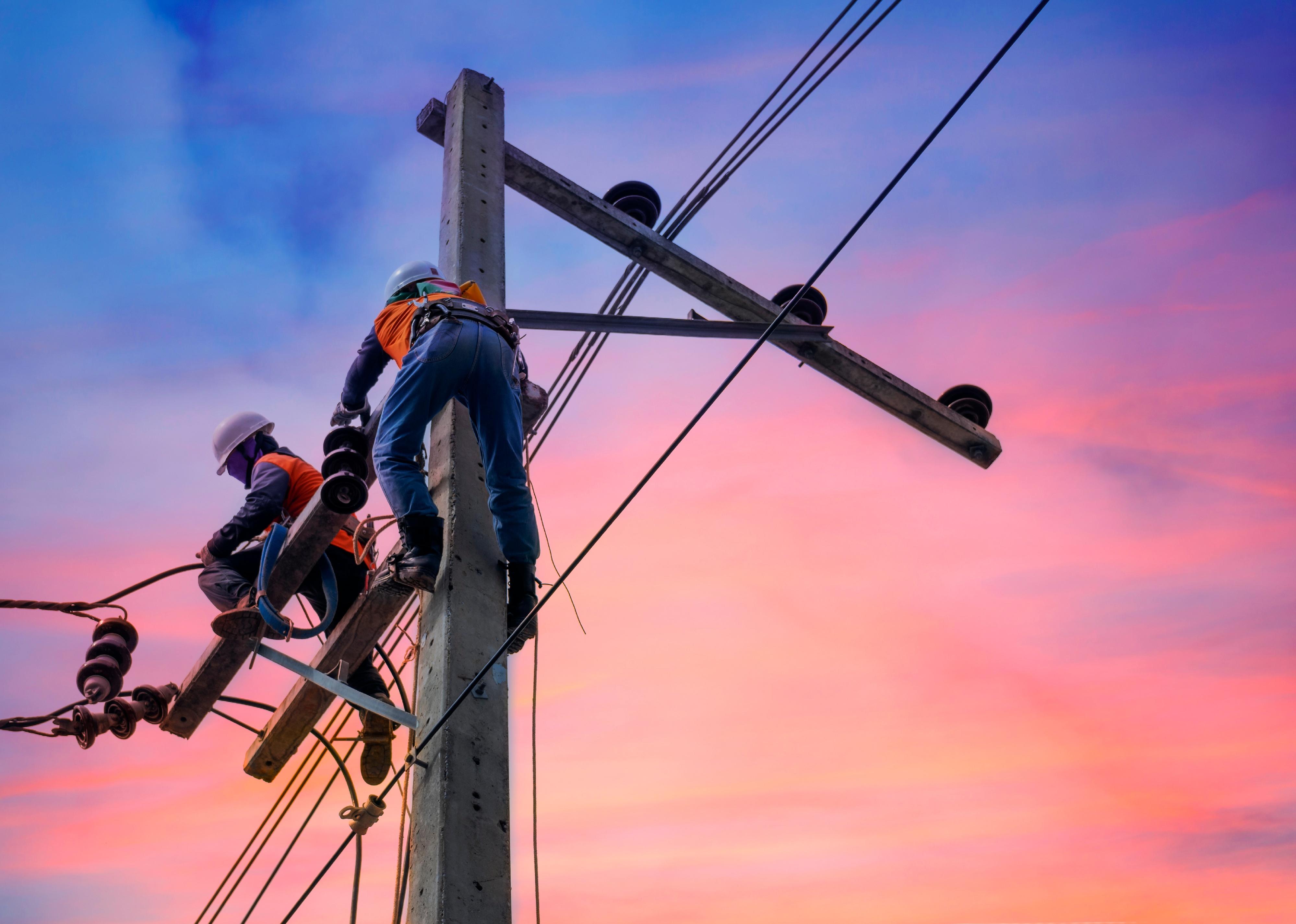 Lineman working on a pole.