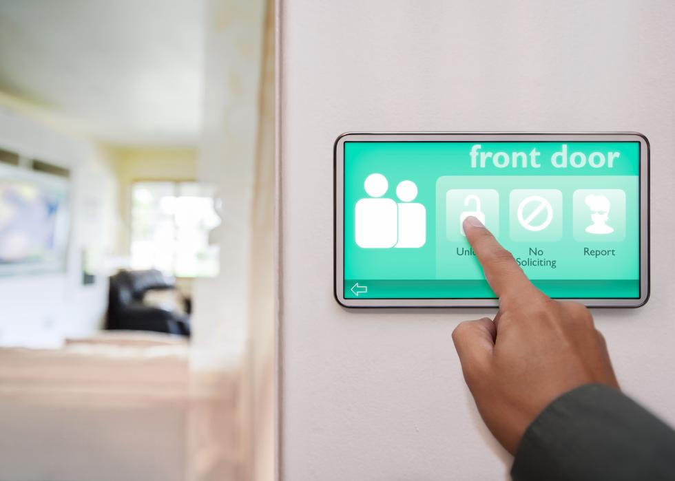 Homeowner unlocking front door using a touchscreen device