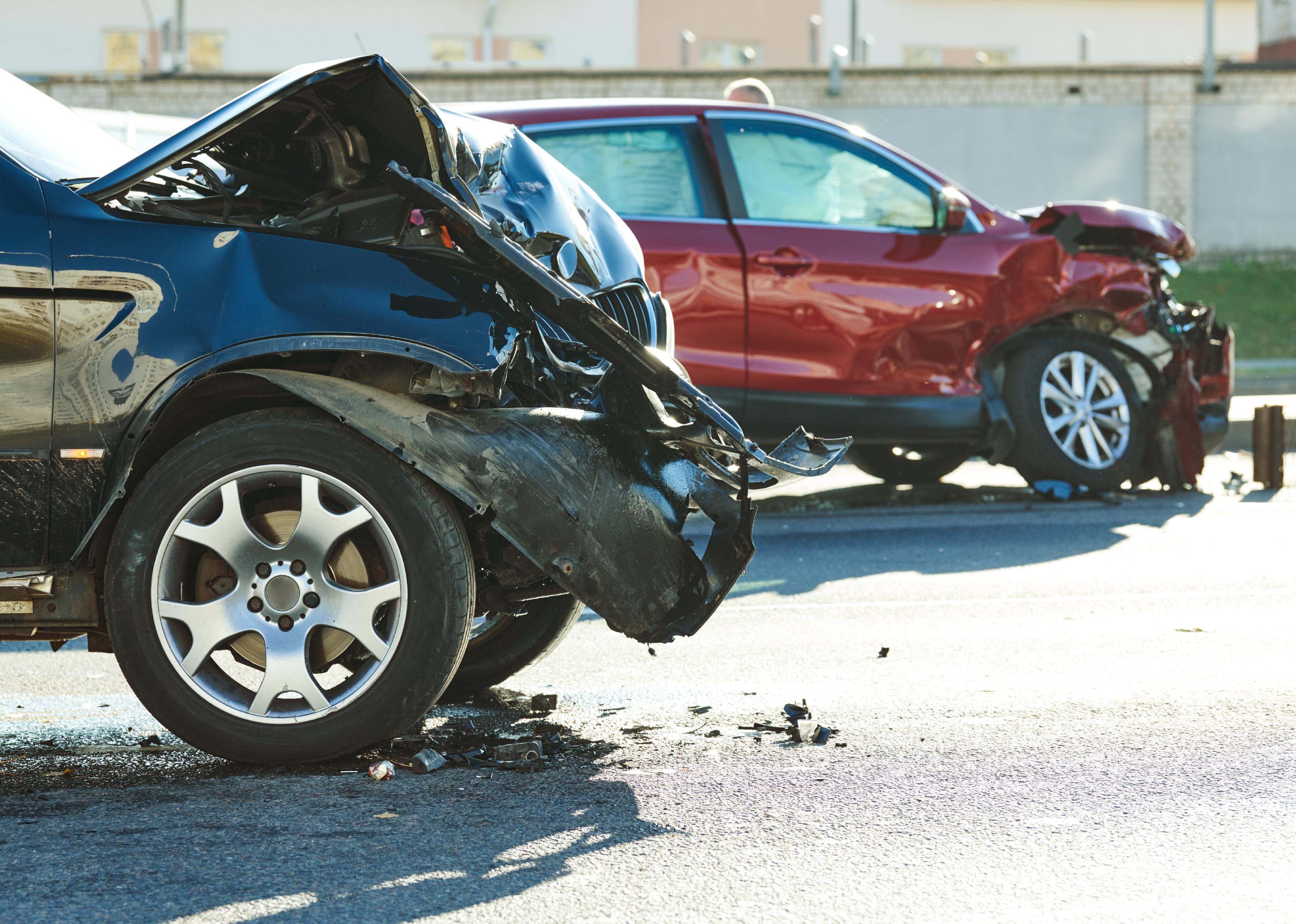 Two cars, side view, after an accident.