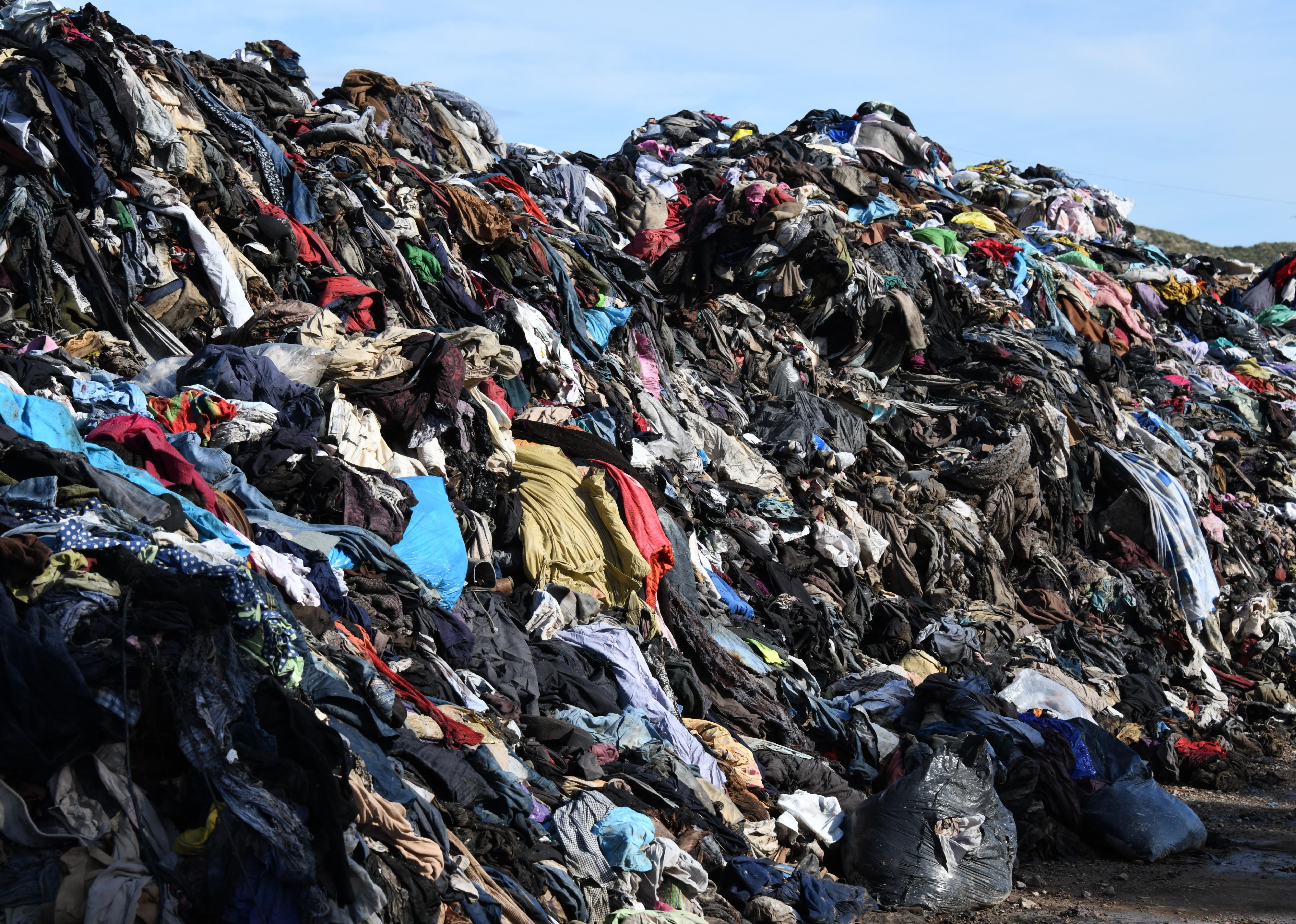 Burnt clothes in a large pile.