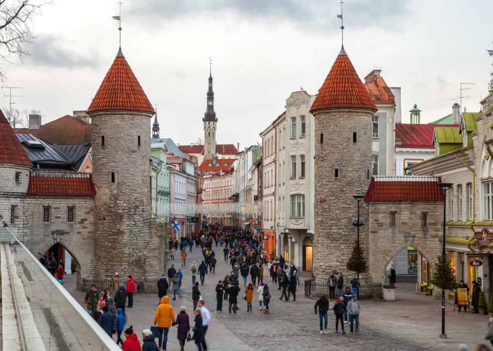 People walking on cobblestone street in Tallinn, Estonia