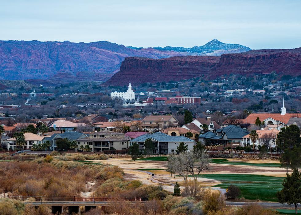 White temple and red rock mountains in St. George, Utah