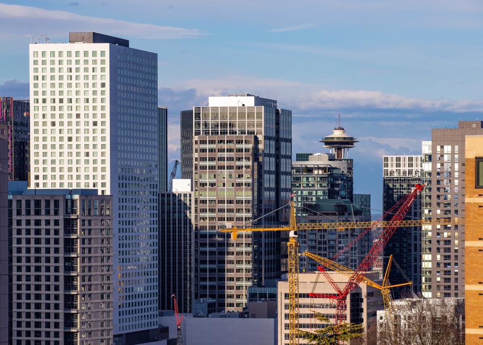 Downtown Seattle with modern high-rise buildings and cranes.
