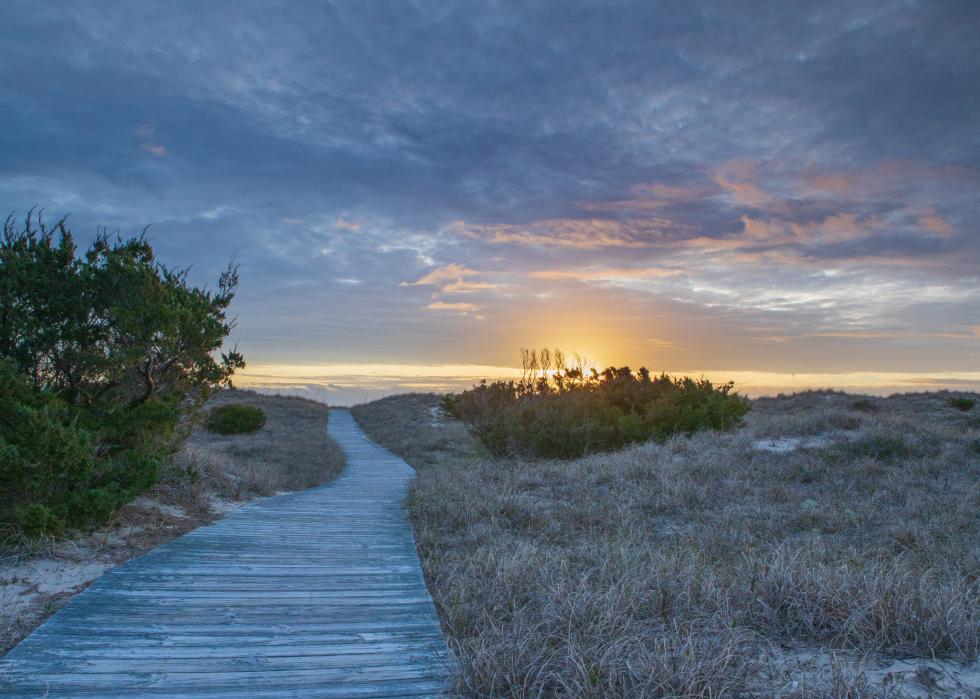 Path to beach and sunset.