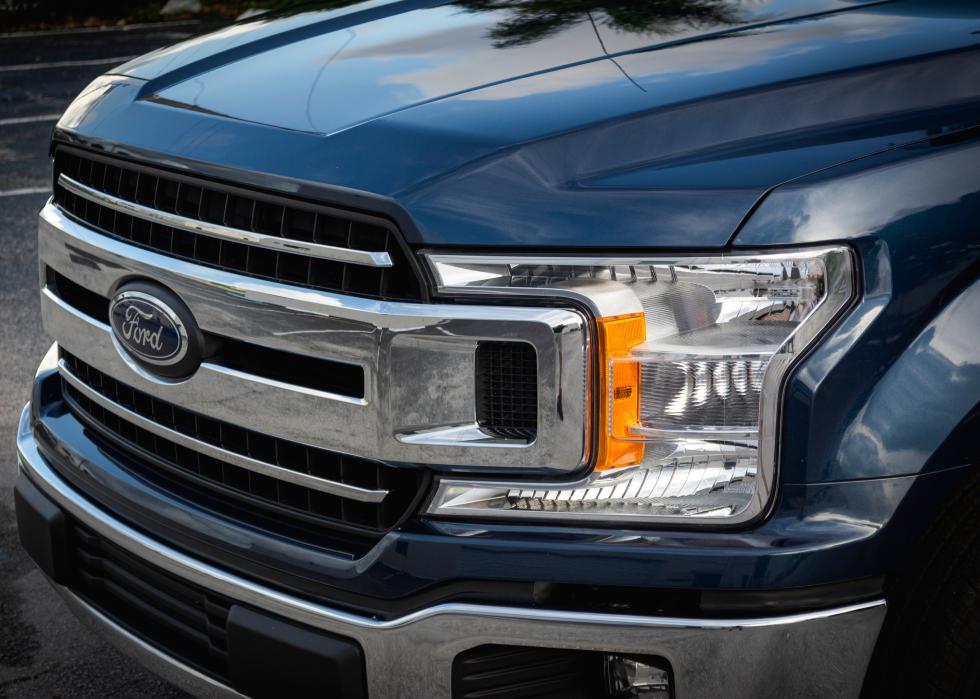 Front view of a blue Ford F-150 XLT.