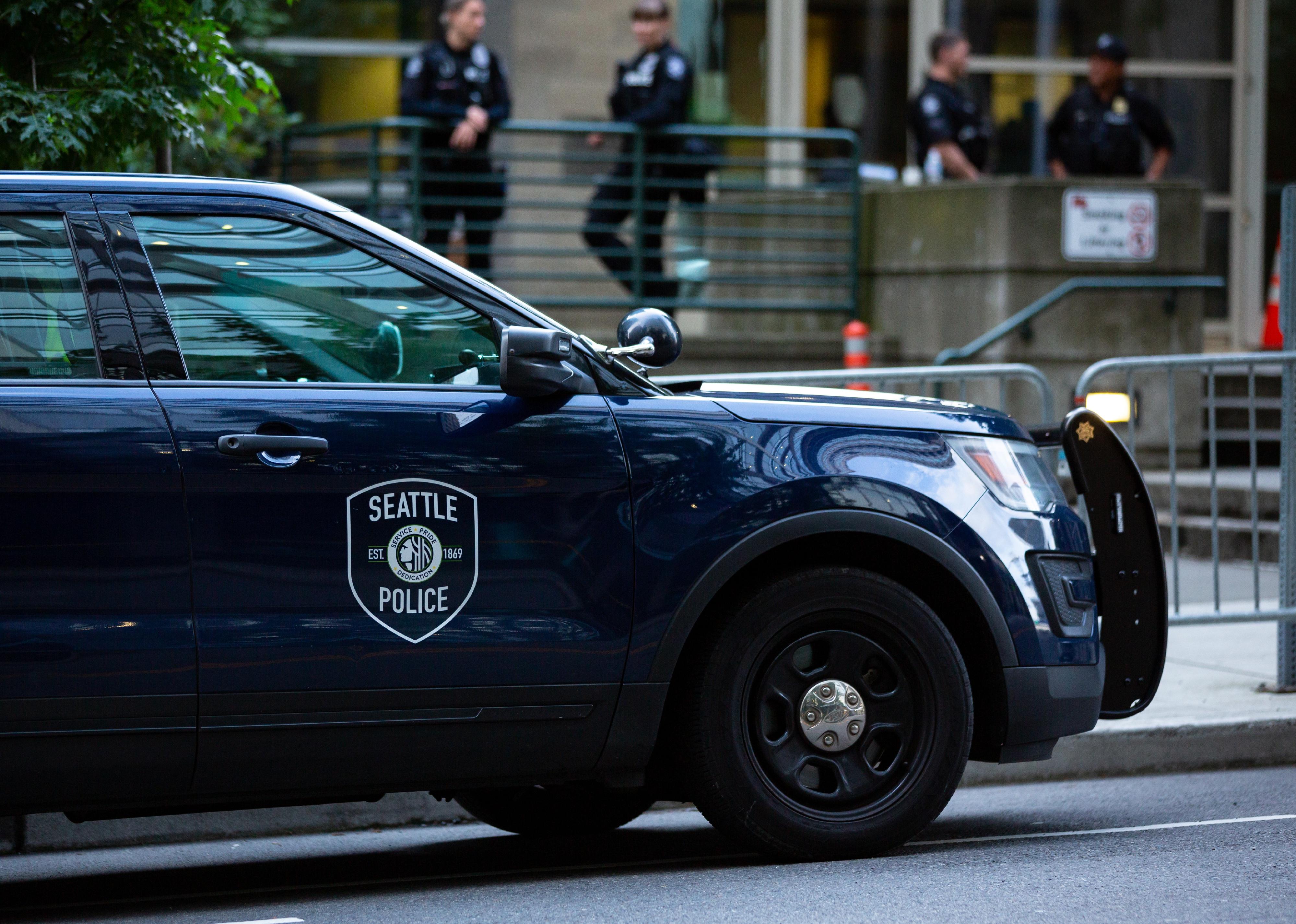 Squad car in front of the Seattle Police Department.