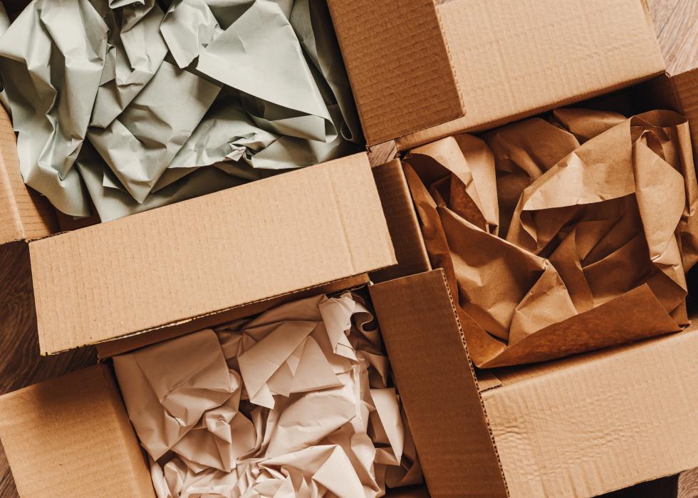 Cardboard boxes with crumpled paper inside