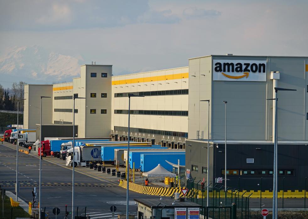 Amazon distribution center with trucks