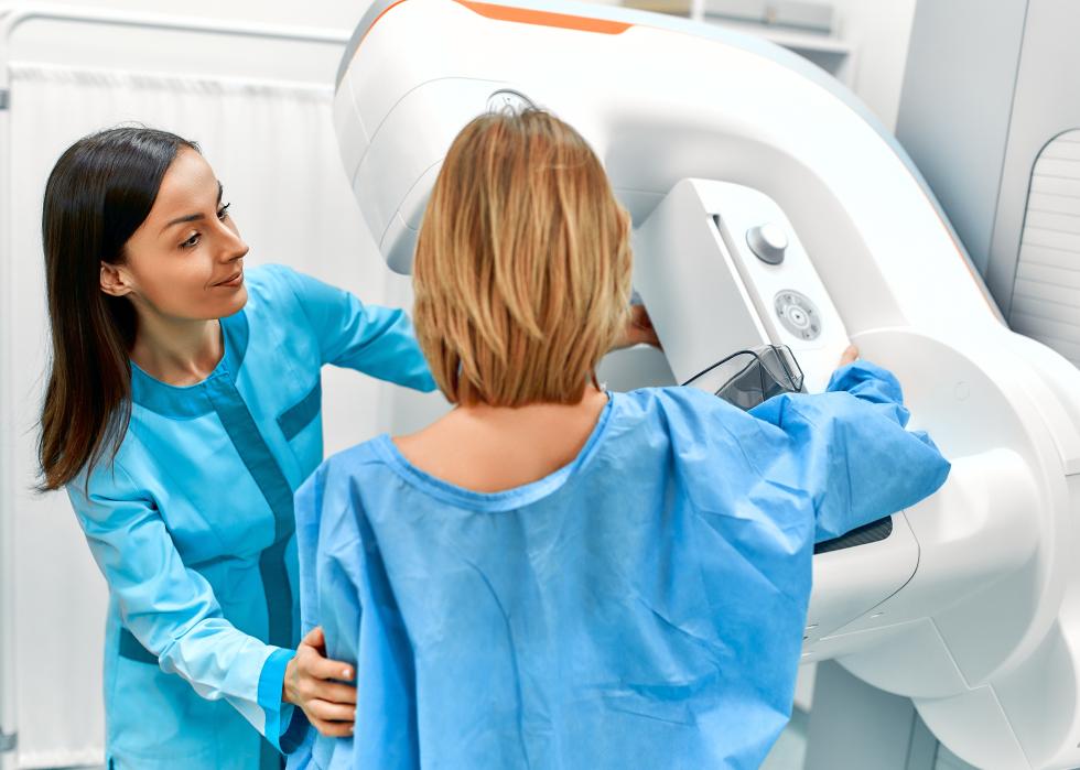 A doctor and patient as she undergoes a mammogram