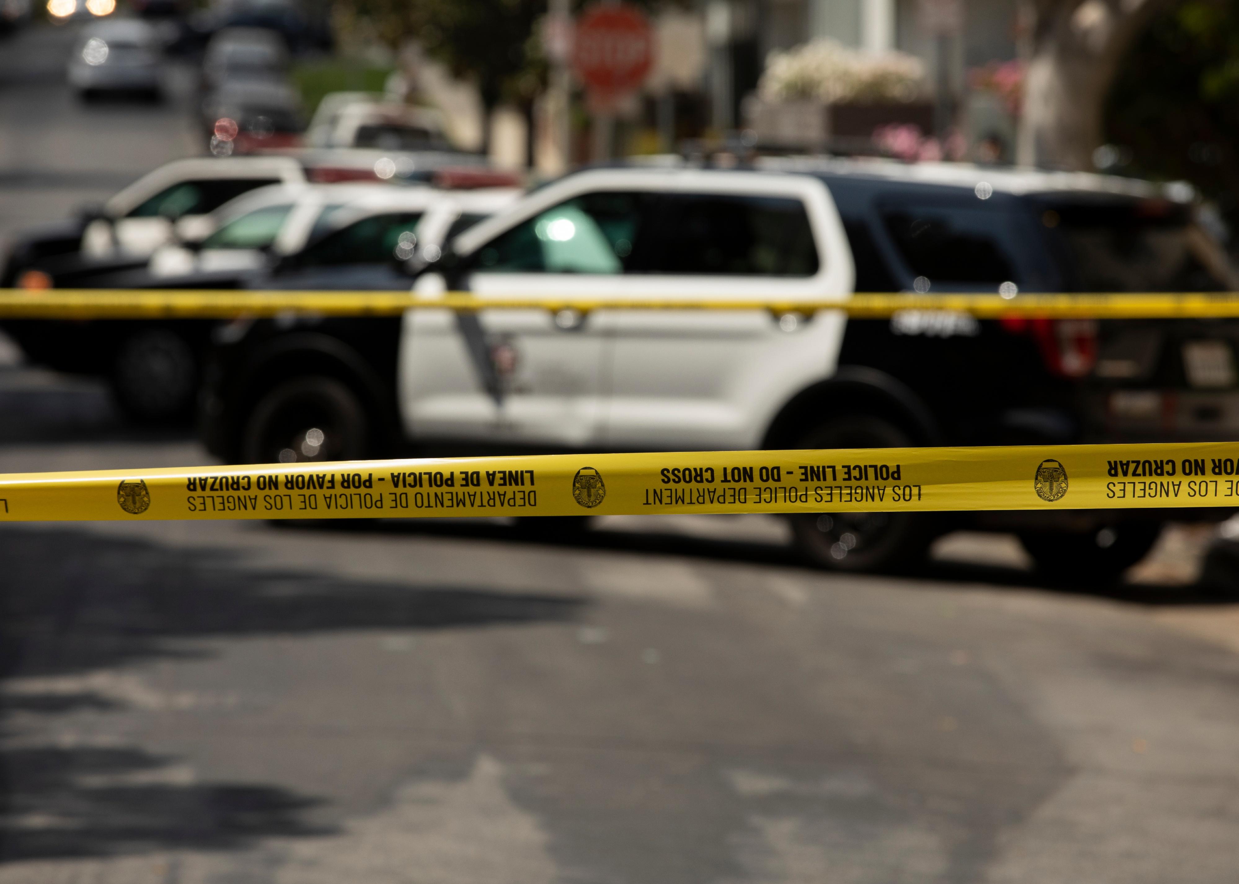 Cordon tape secures the scene of an LAPD incident.