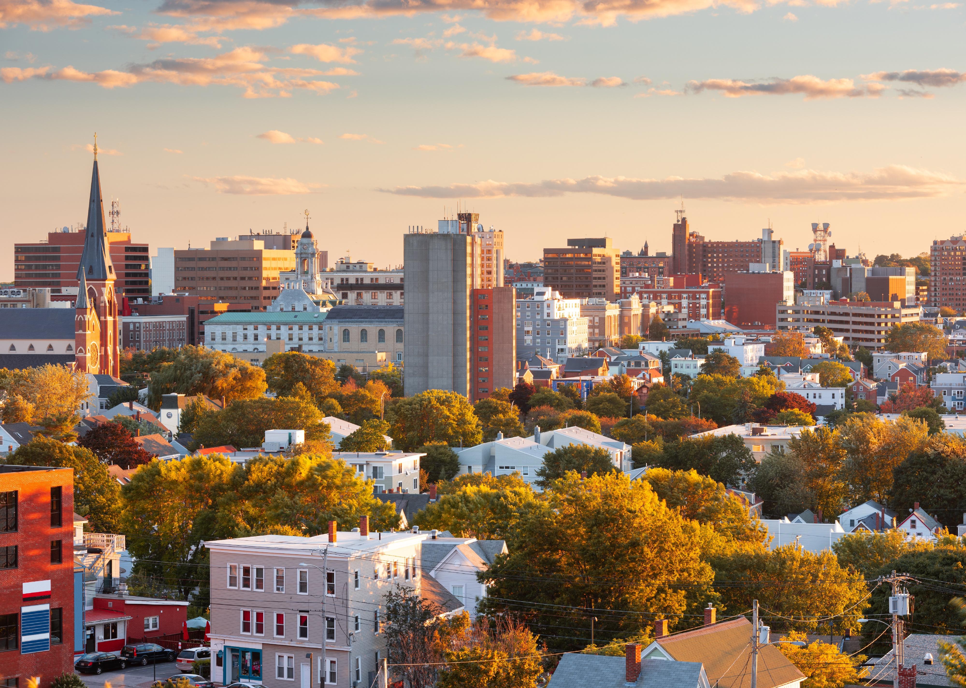 Portland, Maine downtown city skyline at dusk.