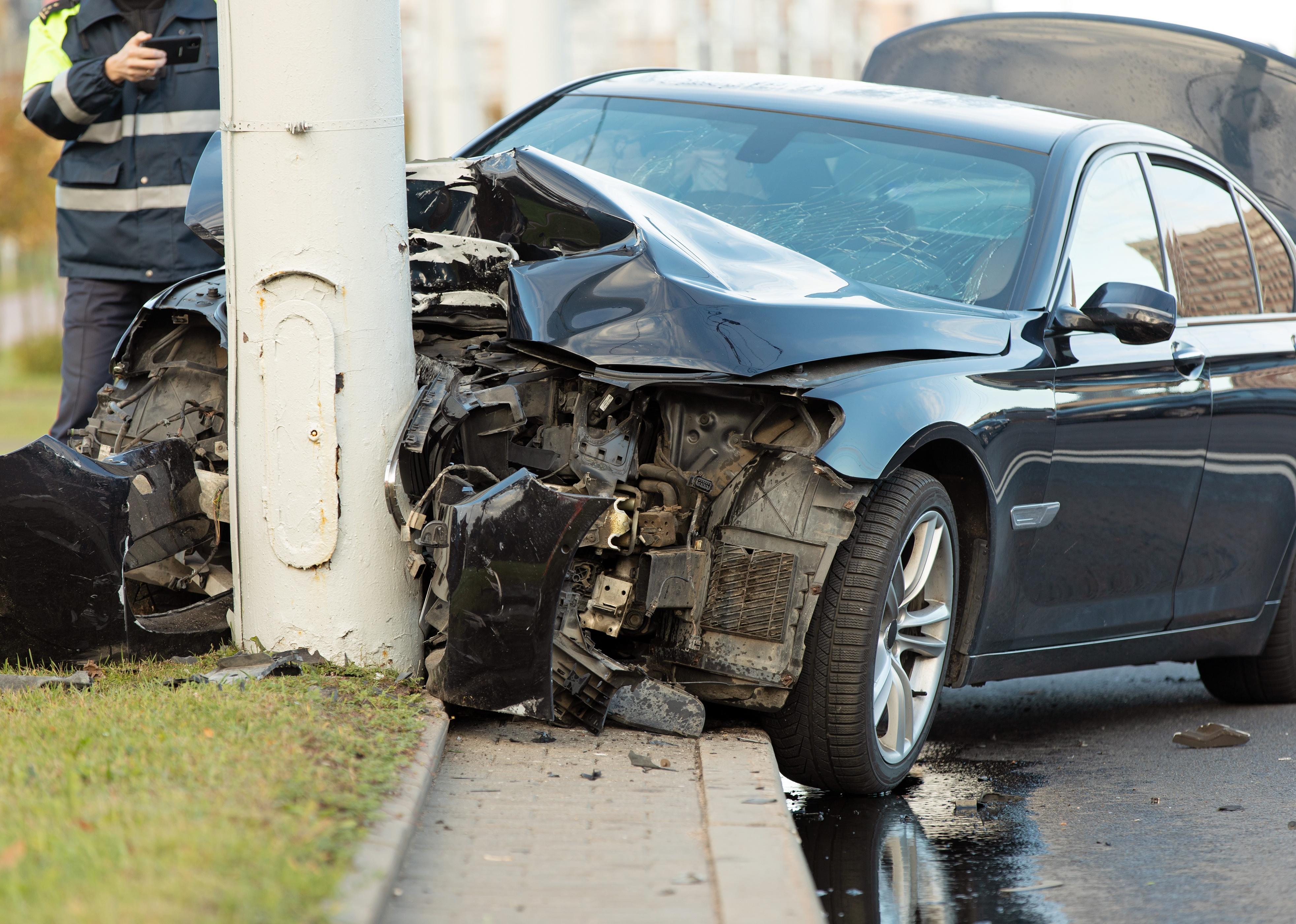 Car after crashing into a utility pole.